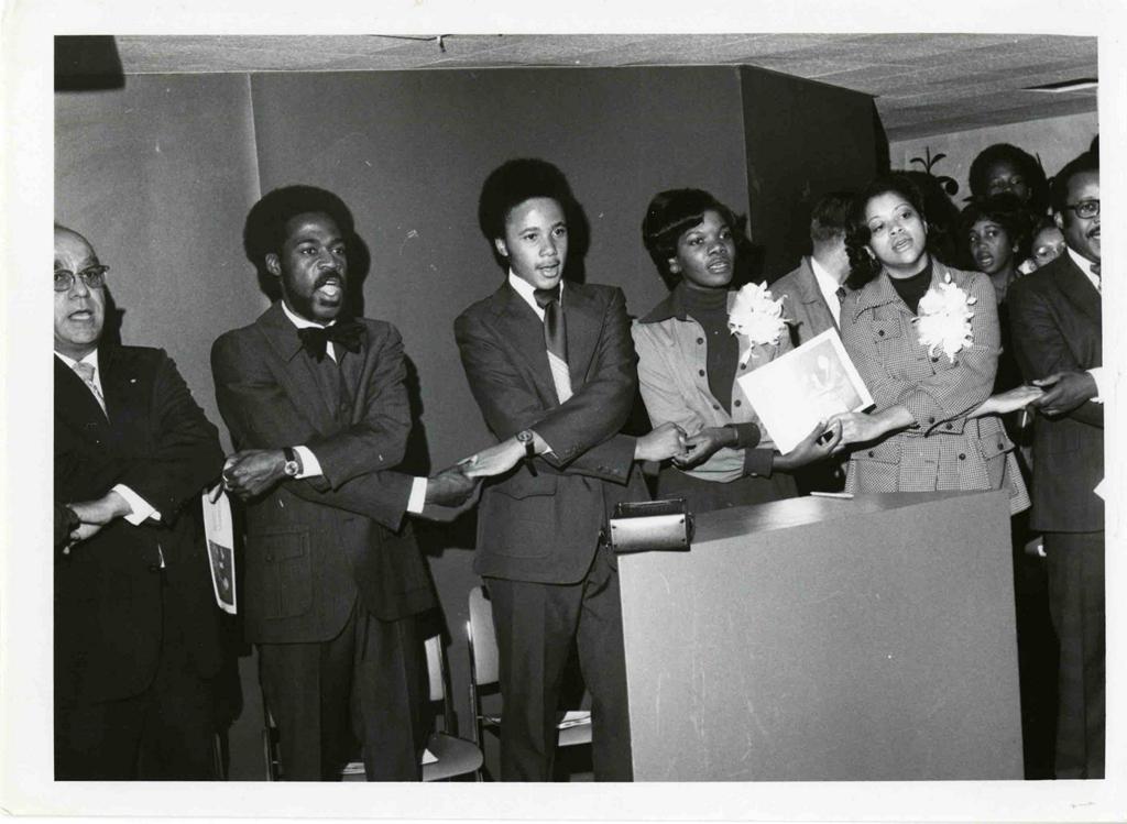 Tuskegee University President Luther H. Foster singing with students; ca. 1968. Courtesy of the Tuskegee University Archives, P.H. Polk Collection, 2017.
