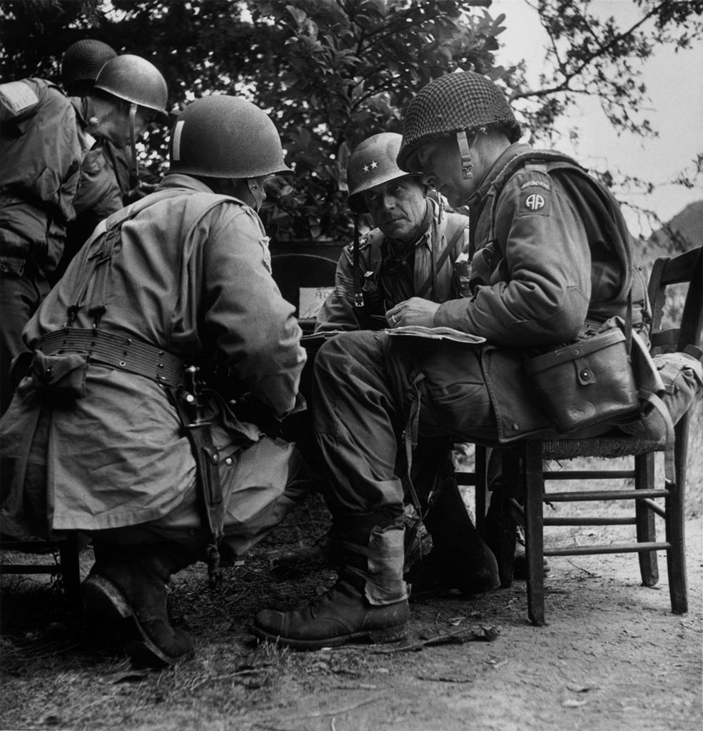 Robert Capa. Normandy; A meeting of Senior American officers; in the middle: Gen. Matthew B. Ridgeway. 1944. ©ROBERT CAPA © 2001 By Cornell Capa / Magnum Photos