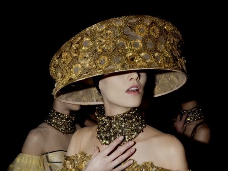 Woman with hat backstage at Paris fashion week